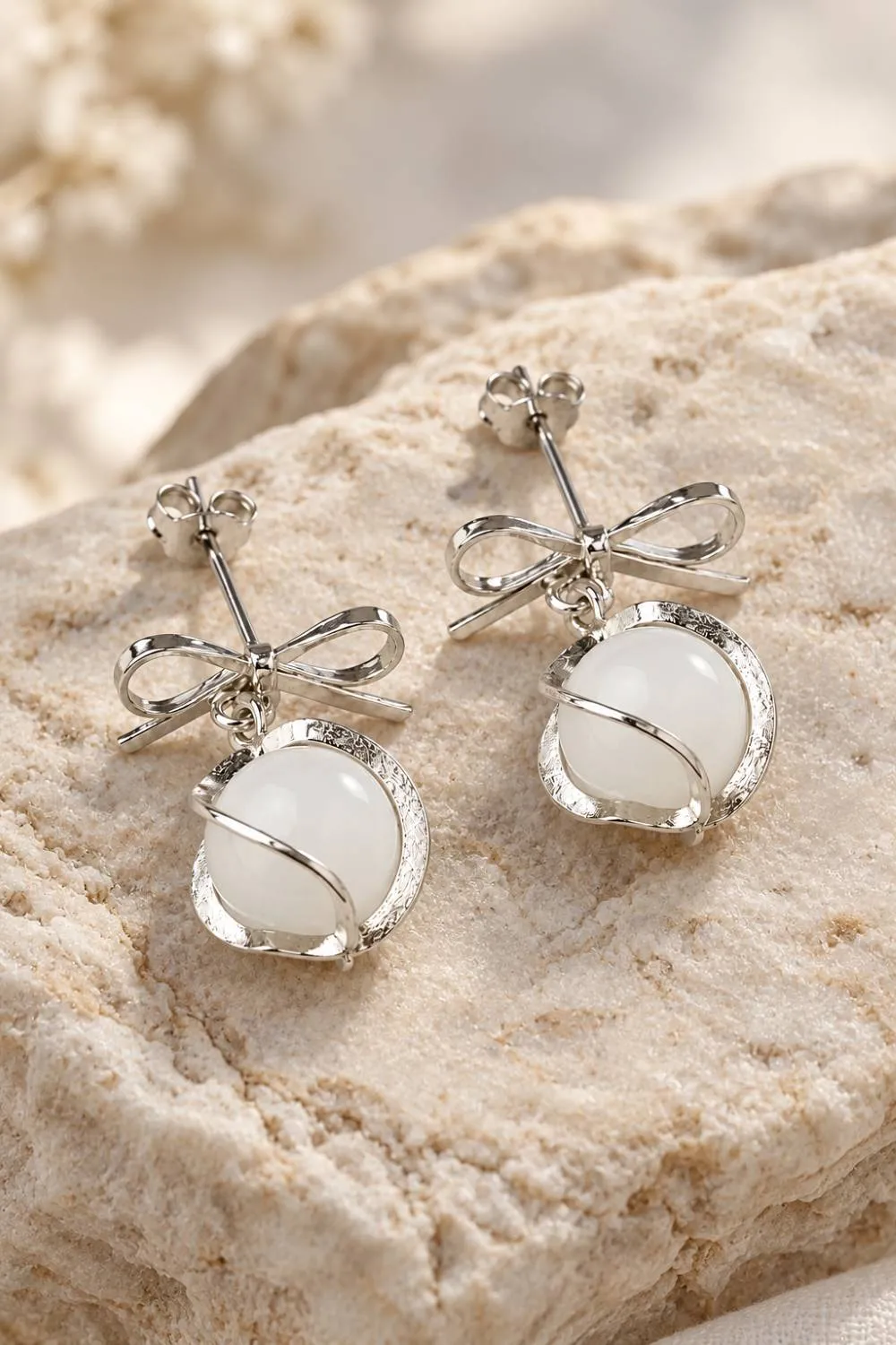 Organsk Bow & Moonstone Drop øreringe sølv hvid sten